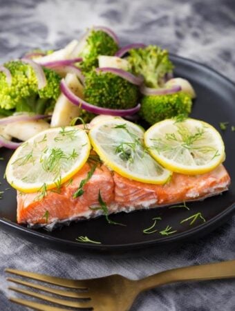 Instant Pot Lemon Butter Salmon and Vegetables on black plate