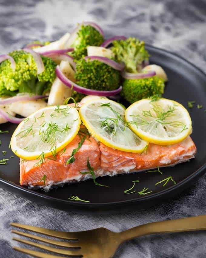 Instant Pot Lemon Butter Salmon and Vegetables on black plate