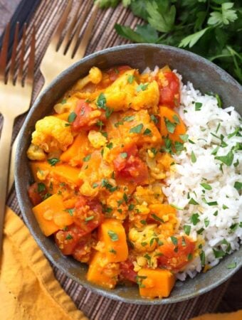 Instant Pot Red Curry Vegetables with rice in grey bowl