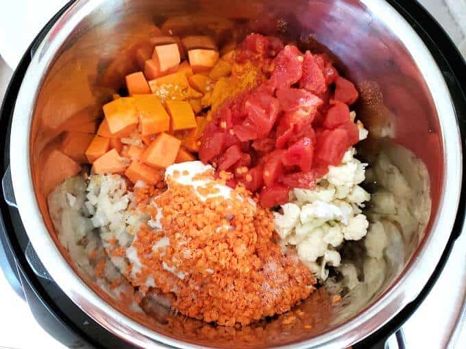 Ingredients for Vegetable curry in pot before cooking