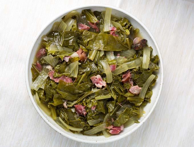 Slow Cooker Collard Greens in a white bowl