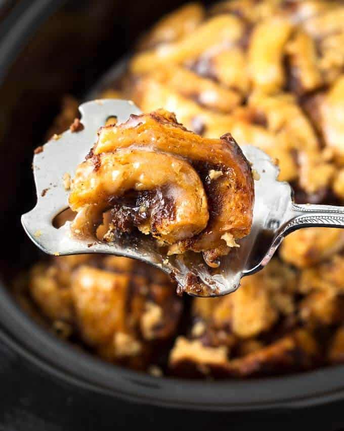 Close up of spoonful of Slow Cooker Cinnamon Roll Casserole