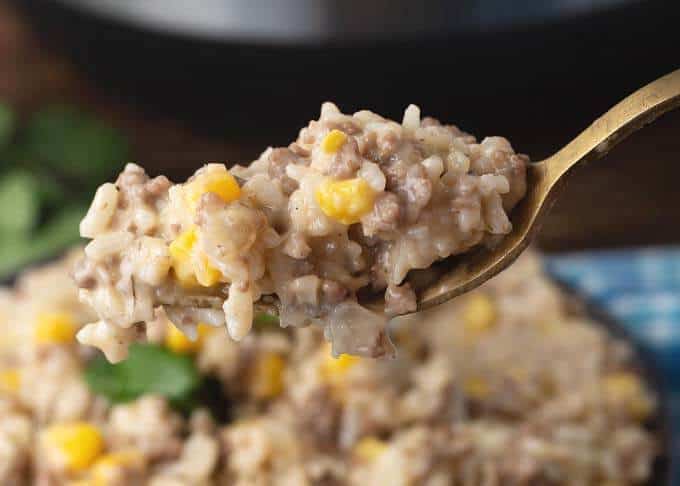 Close up of forkful of Cheesy Hamburger Rice Casserole