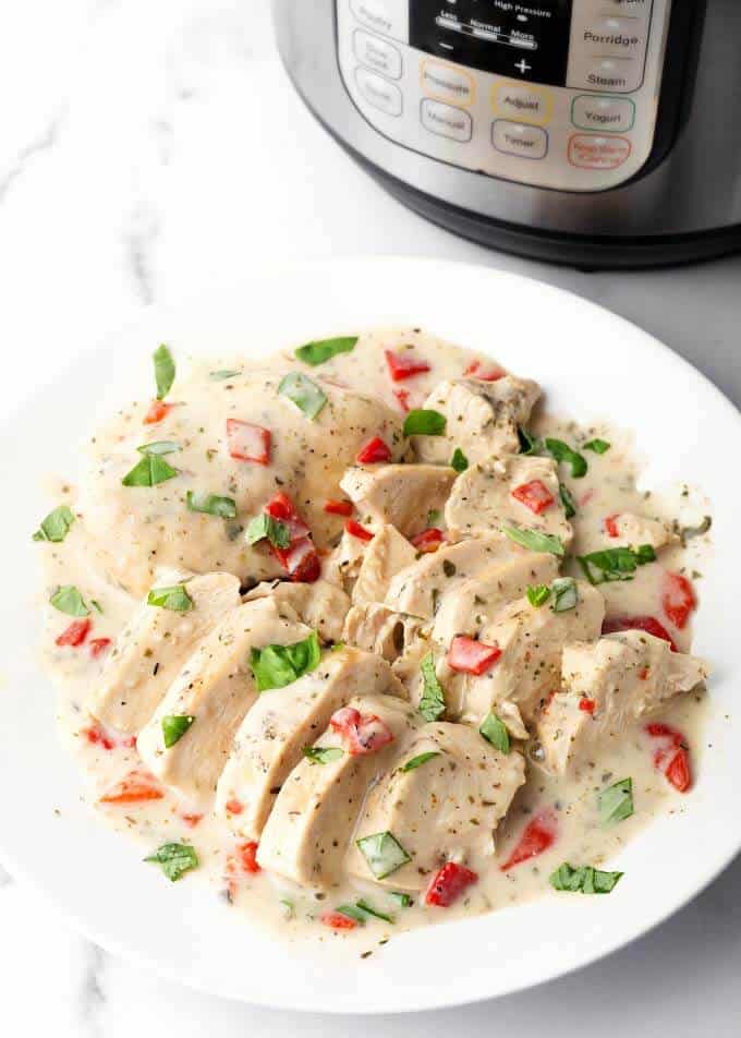 Sliced Chicken Breasts on a white plate