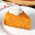 Instant Pot Sweet Potato Pie slice on a white plate