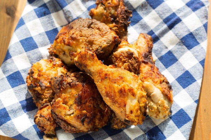 air fryer fried chicken on a blue and white checkered cloth