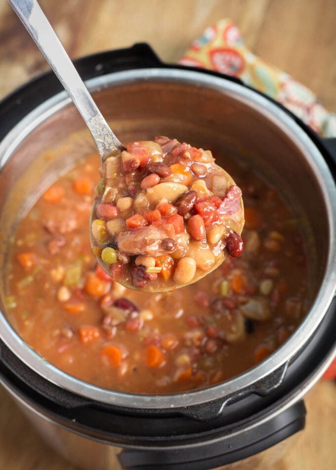 Instant Pot 15 Bean Soup in pot with a ladle full