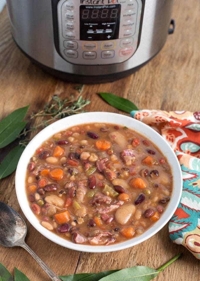Instant Pot 15 Bean Soup in white bowl, IP behind it