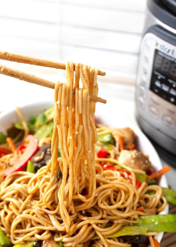 Lo Mein noodles on chopsticks