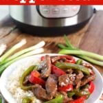 Instant Pot Pepper Steak on a white plate with Instant Pot in background