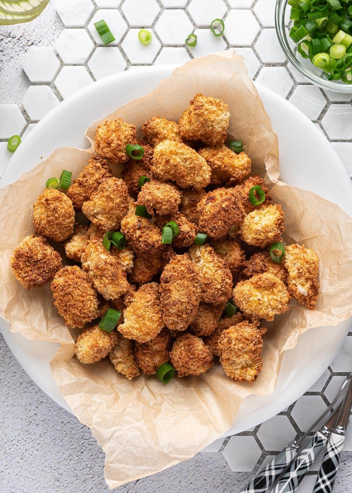 Air Fryer Popcorn Chicken in a white bowl