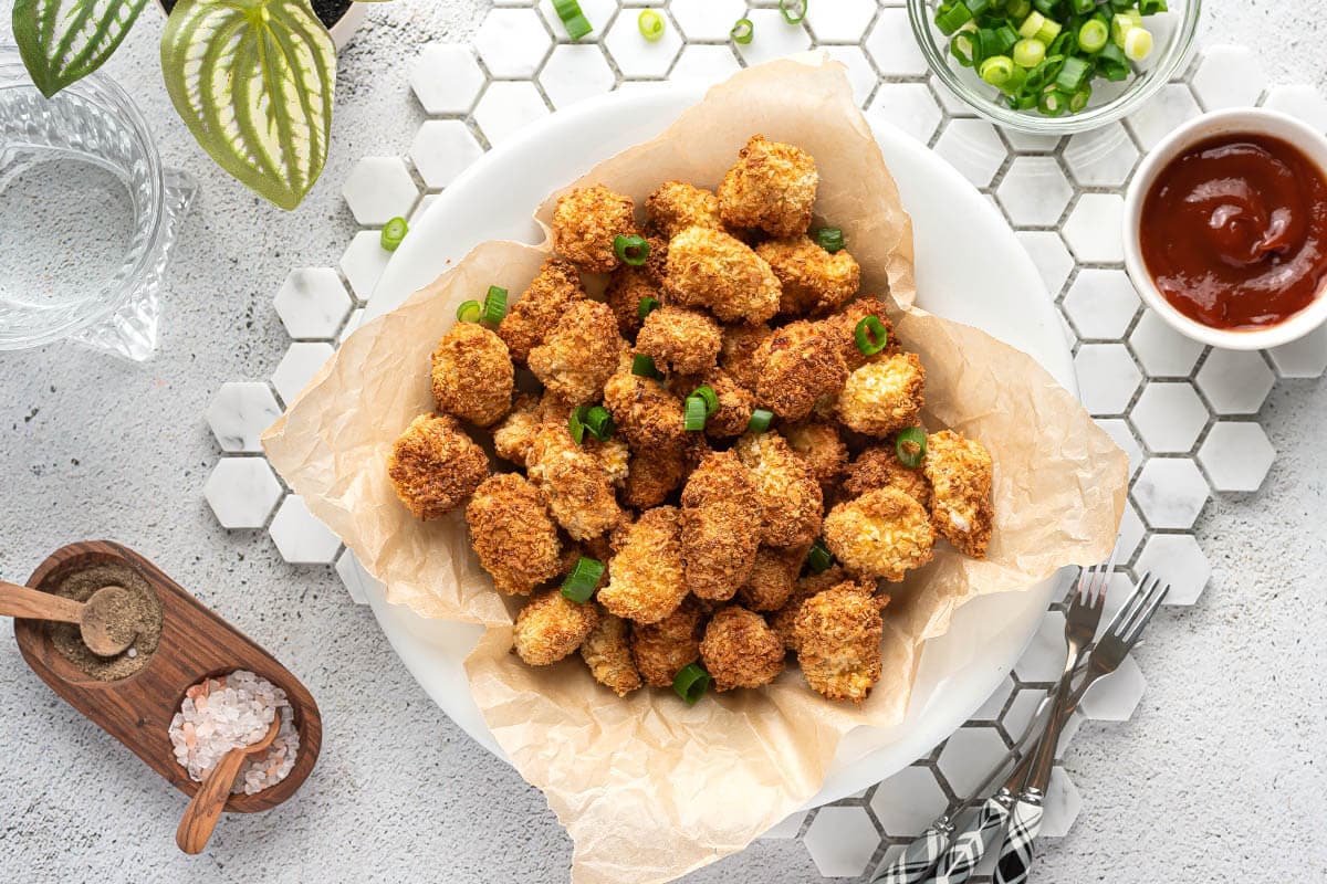 popcorn chicken in a white bowl.