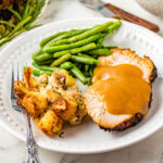 slice of Turkey Breast on a white plate