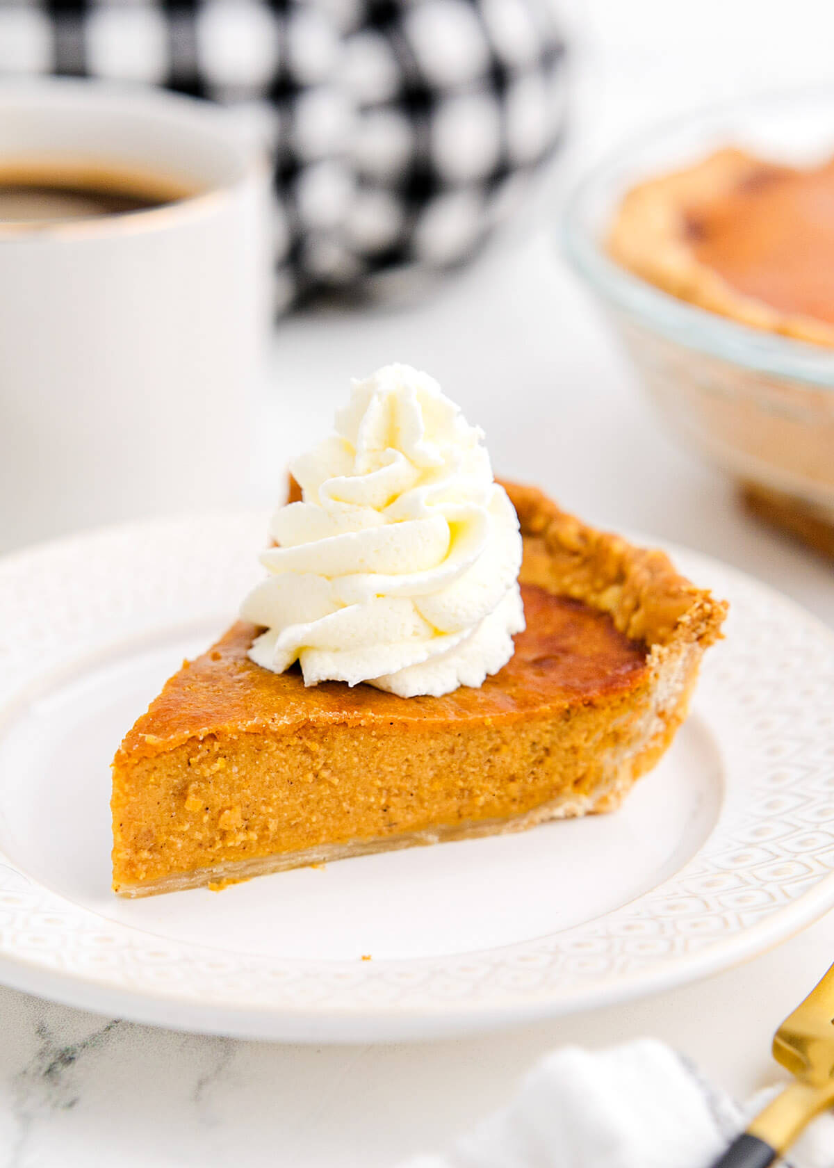 Air Fryer Pumpkin Pie on a white plate