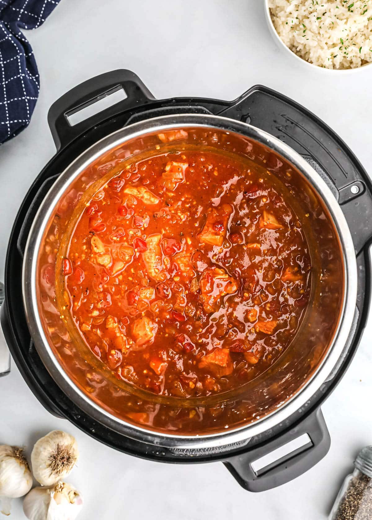 bird's eye view of chicken curry and rice in pot