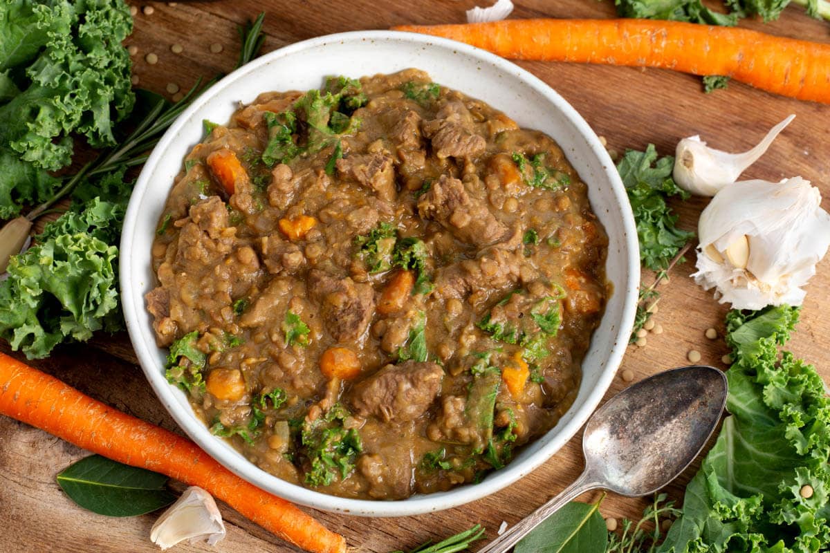 Instant Pot Lentil Beef Stew in a white bowl