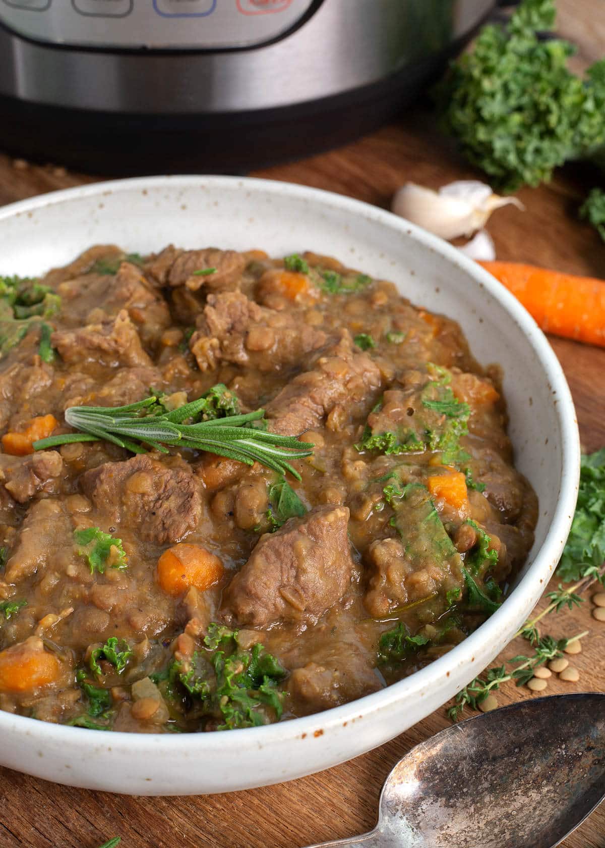 Instant Pot Lentil soup in a white bowl