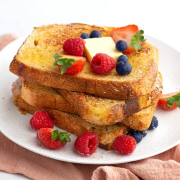 stack of french toast with berries