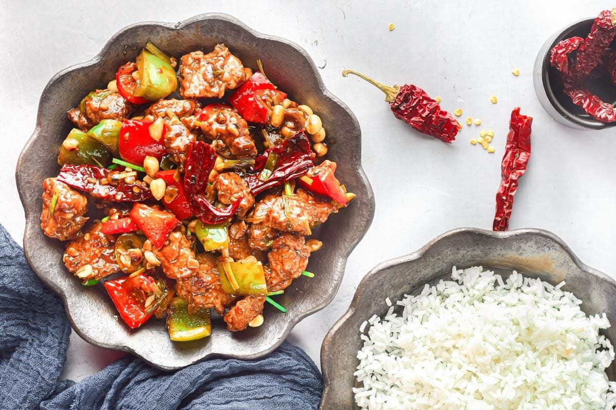 Air Fryer Kung Pao Chicken with rice in bowls