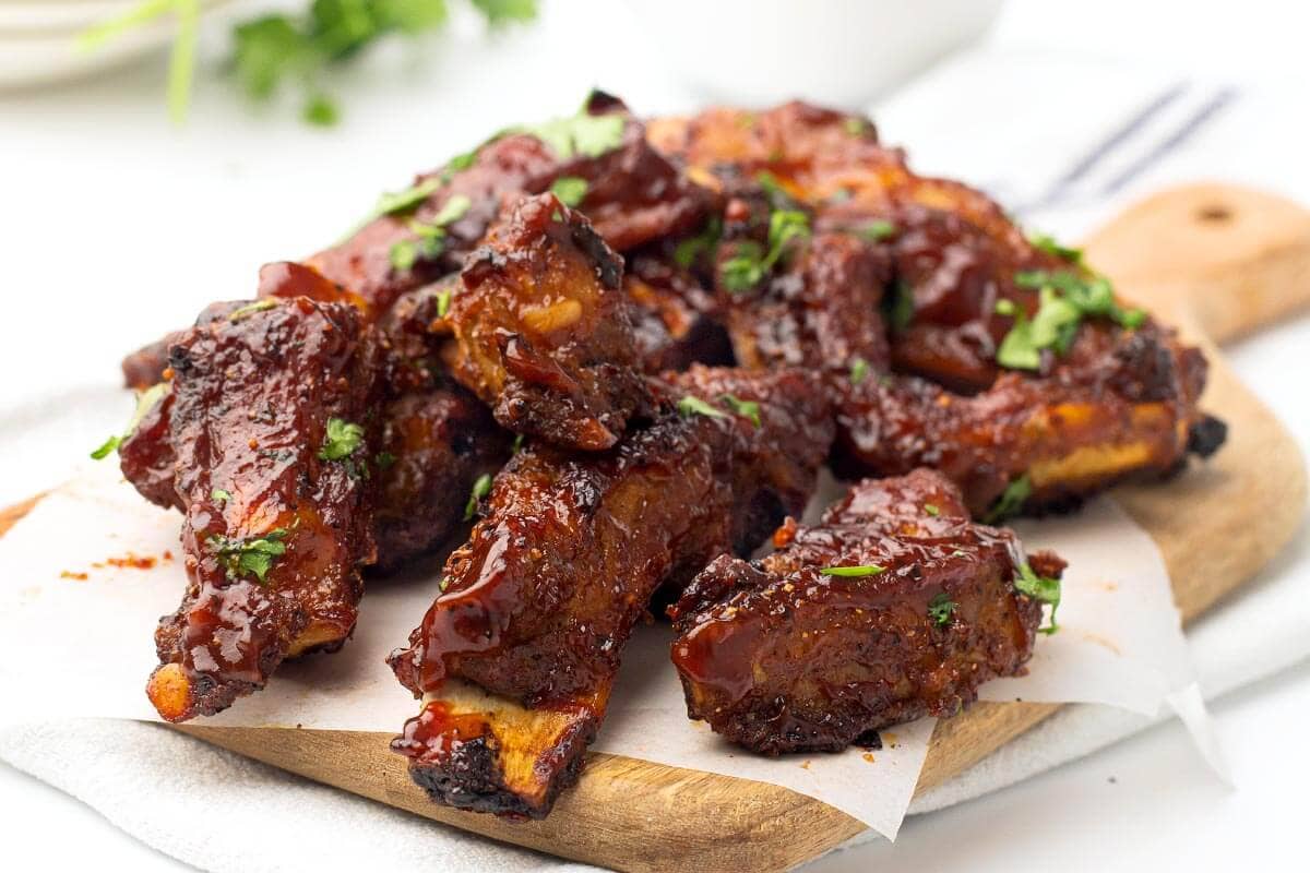 Air Fryer Baby Back Ribs in a pile on paper