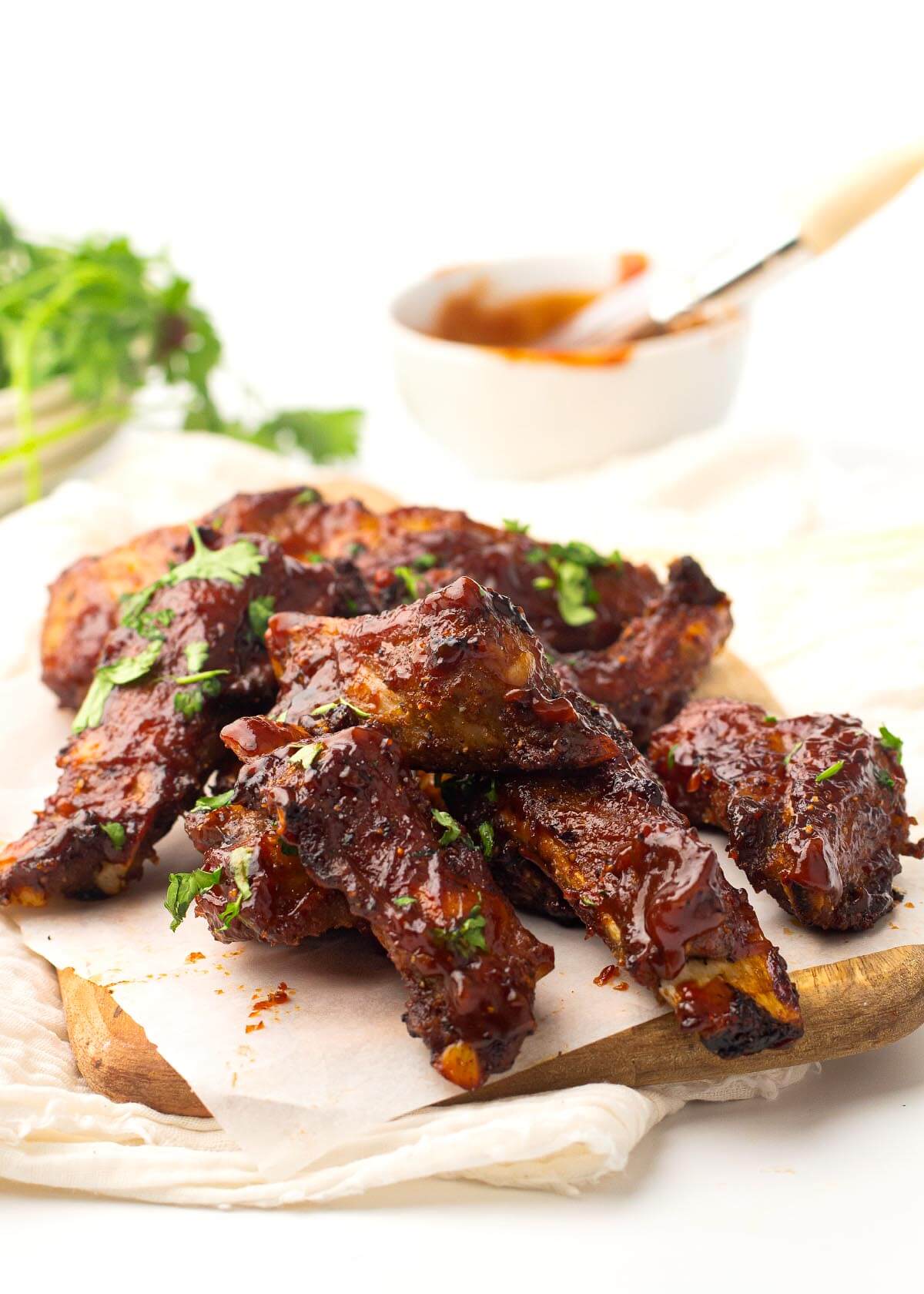 Air Fryer Baby Back Ribs in a pile on paper