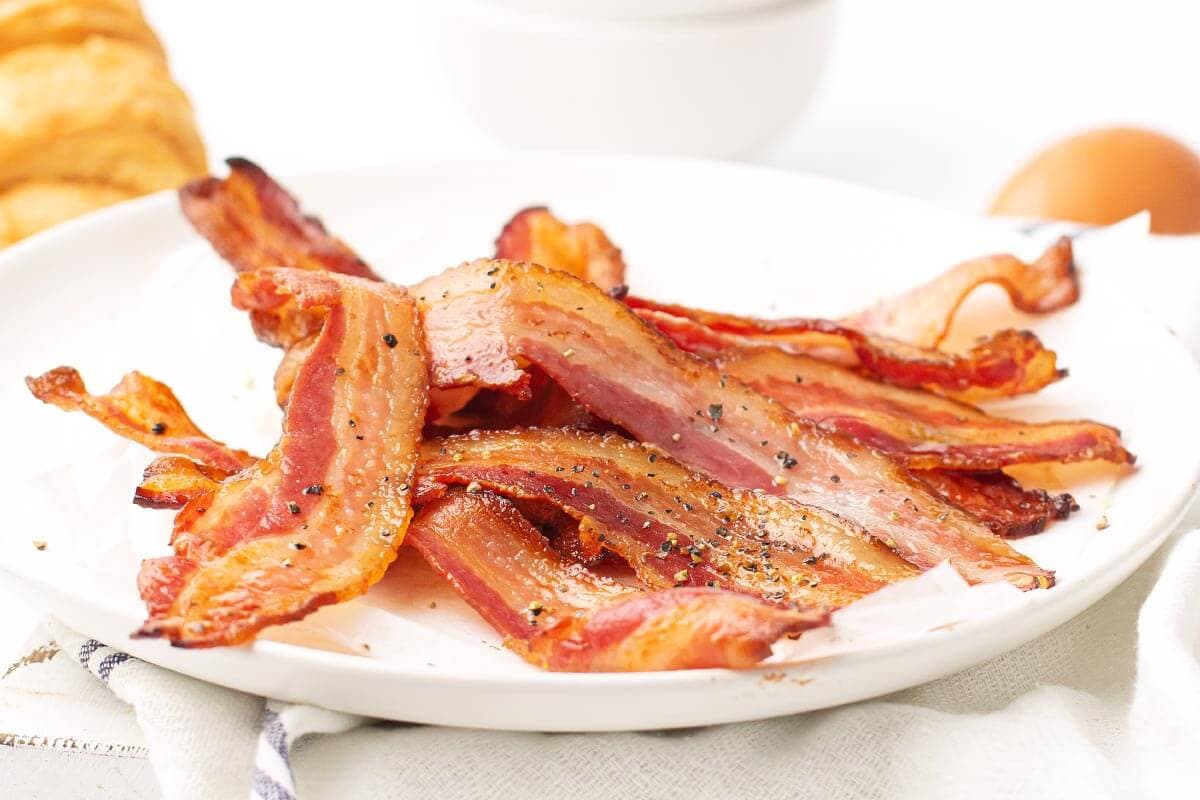 white plate of air fryer bacon