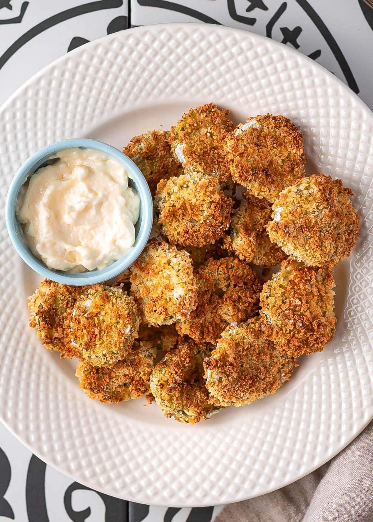 air fried pickles on a white plate