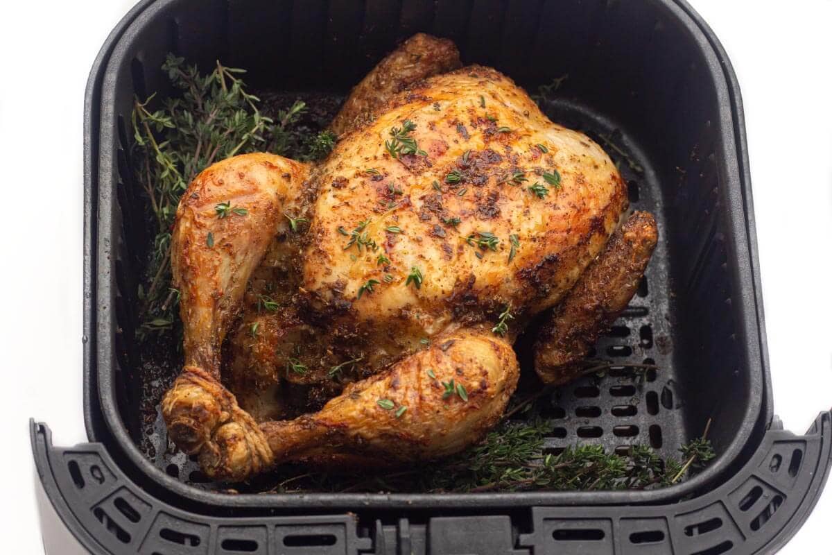 Air Fryer Whole Chicken in air fryer basket