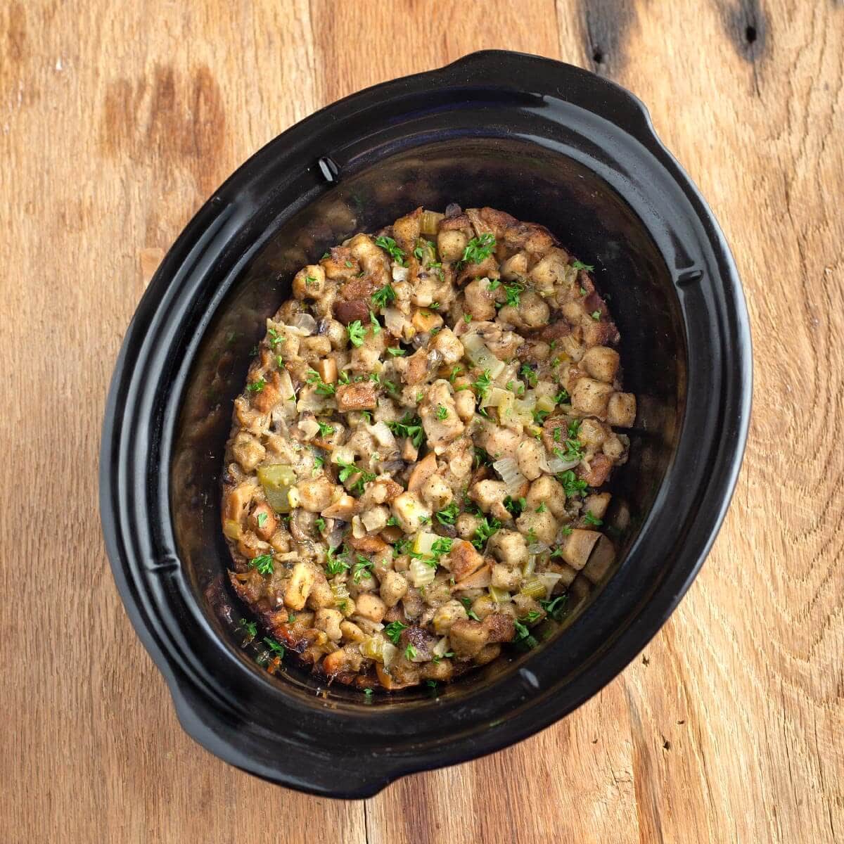stuffing in a black crock from above