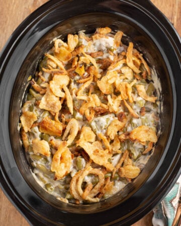 Slow Cooker Green Bean Casserole in a black crock