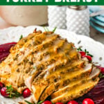 Slow Cooker Turkey Breast sliced on a white plate