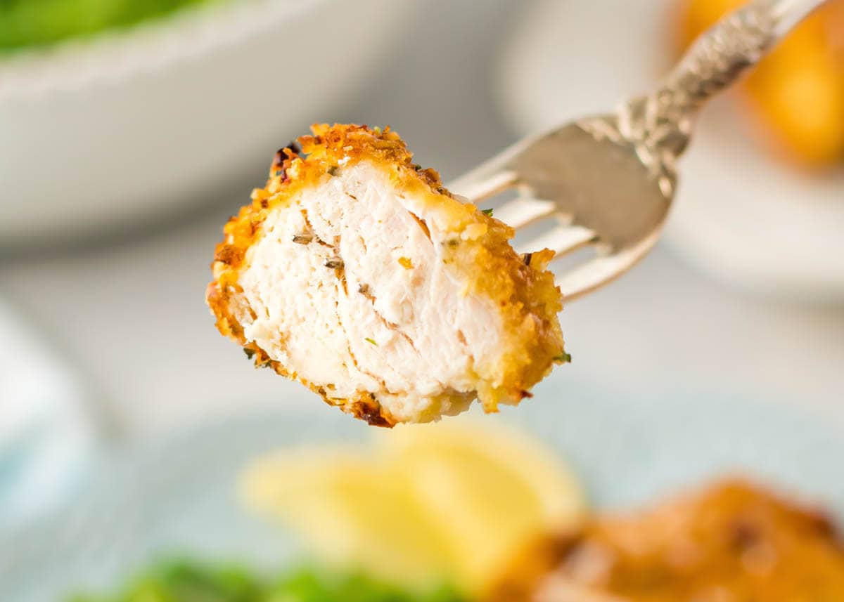 Air Fryer Parmesan Crusted Chicken on a fork