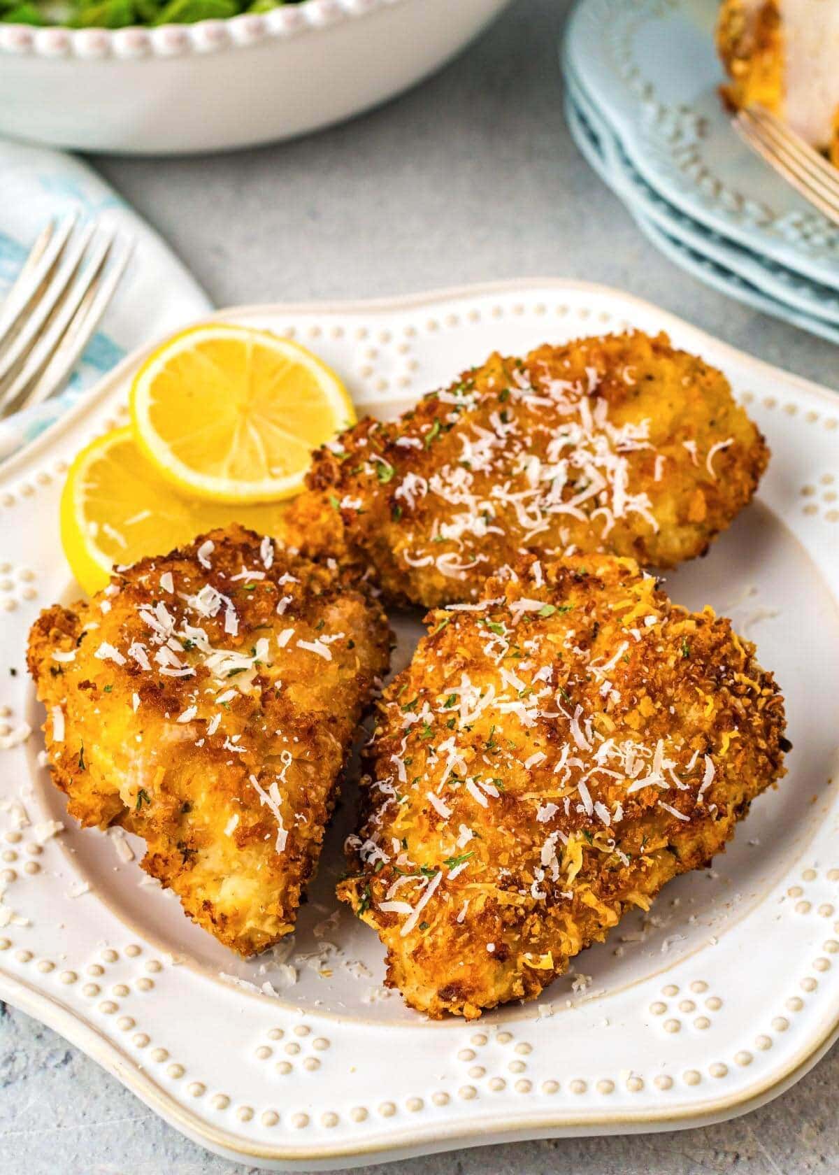 Air Fryer Parmesan Crusted Chicken on a white plate