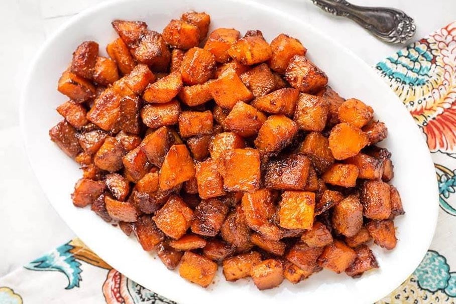 top down view of Roasted Butternut Squash on a white platter
