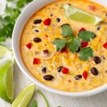 corn soup in a white bowl closeup.