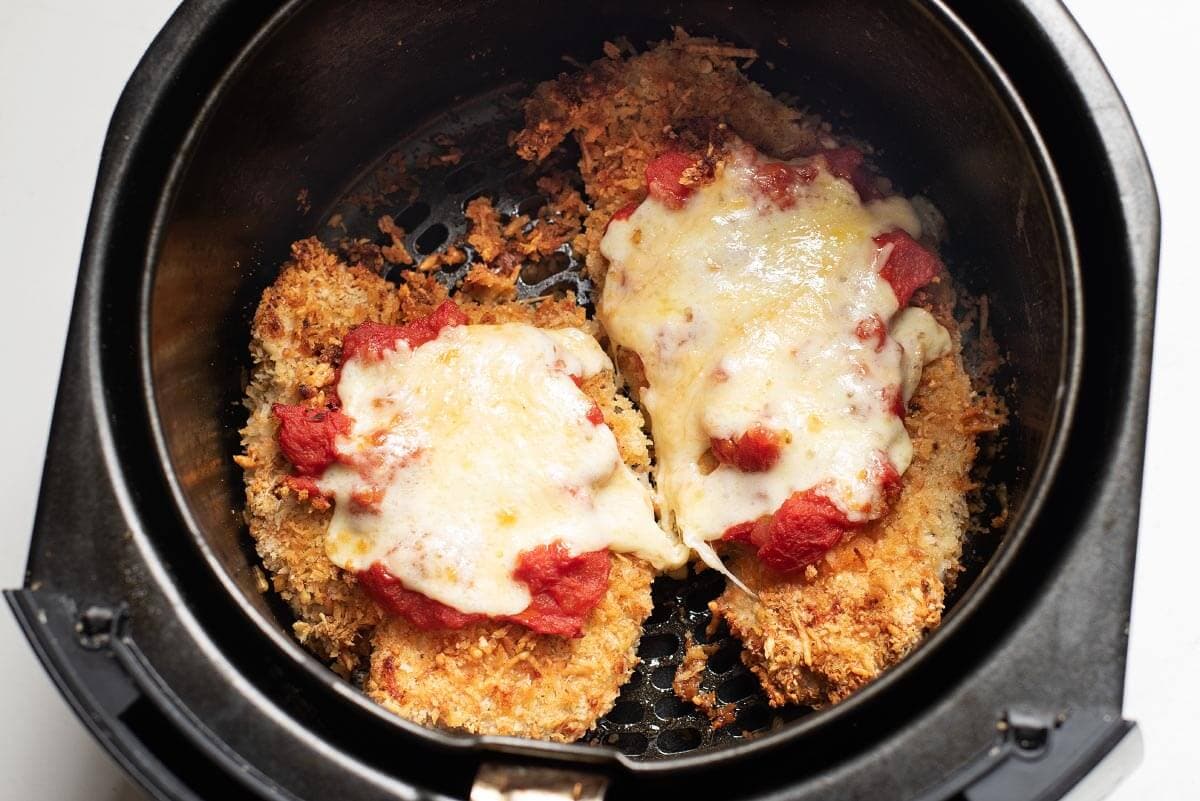 Chicken Parmesan in air fryer basket