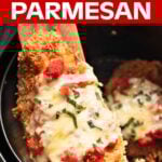 Chicken Parmesan in air fryer basket, on a wood spatula