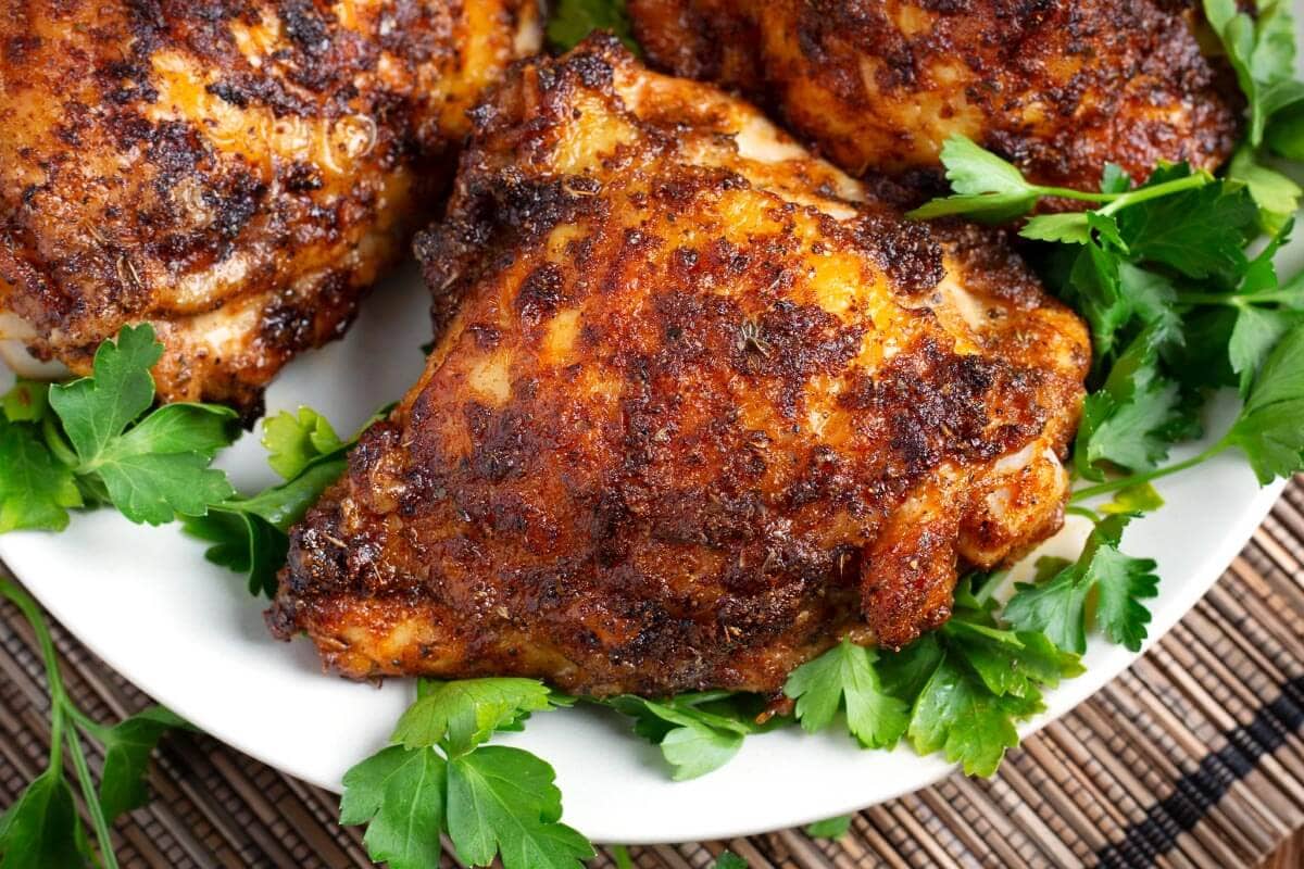 Air Fryer Chicken Thighs on a white plate