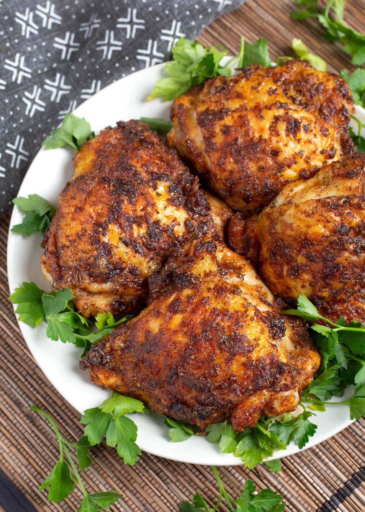 Air Fryer Chicken Thighs on a white plate