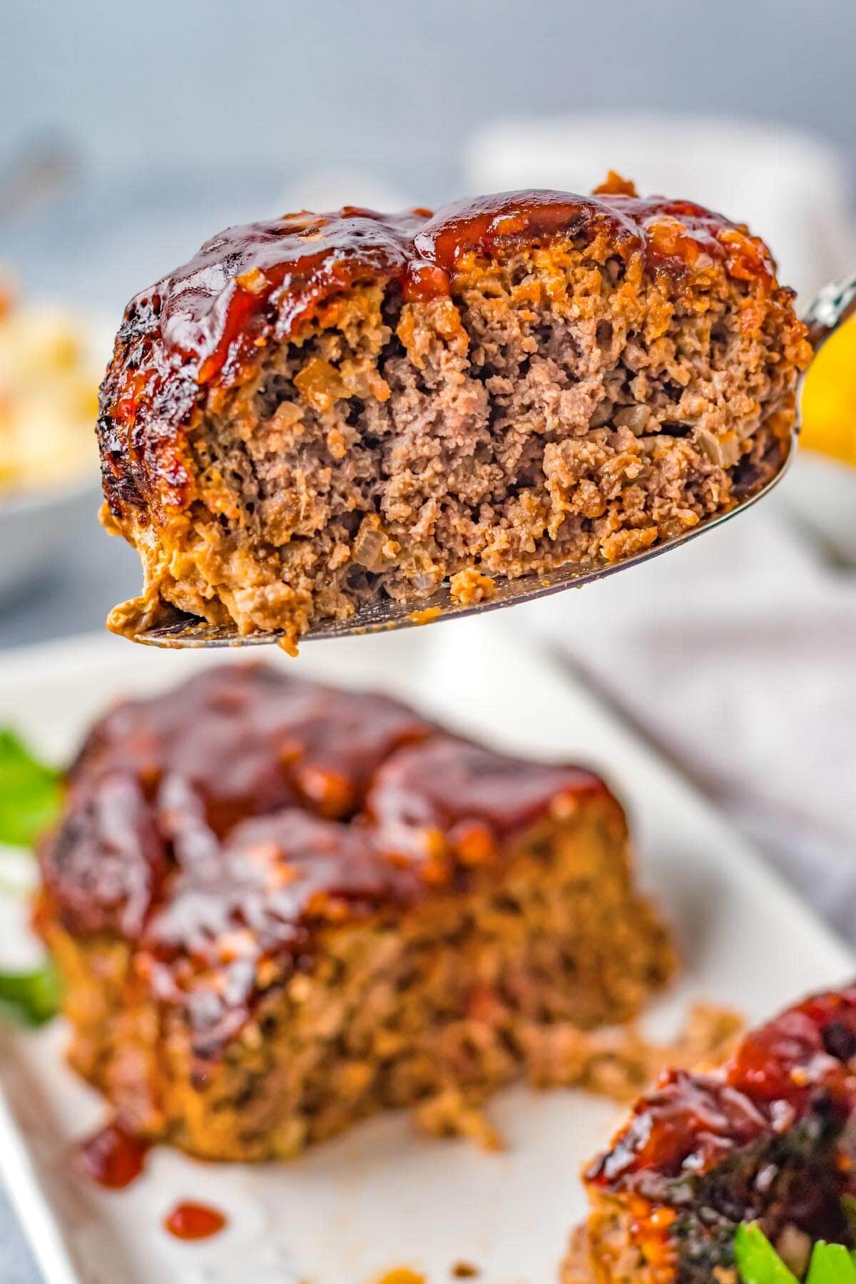 Air Fryer Meatloaf slice on a spatula