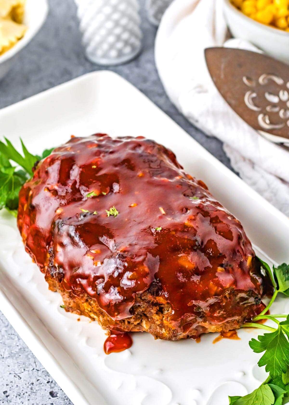 Air Fryer Meatloaf on a white platter