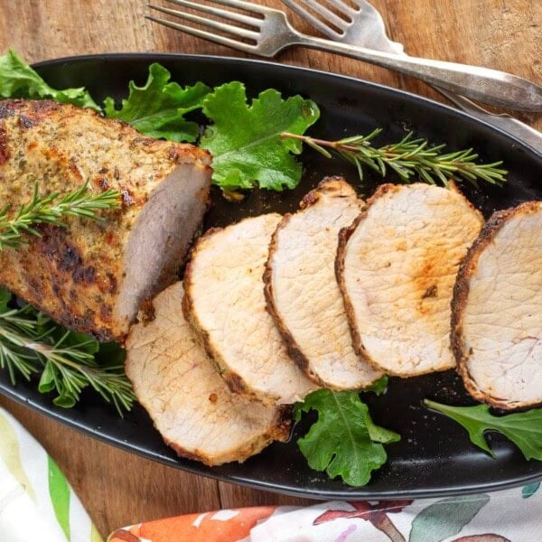 pork roast on black plate
