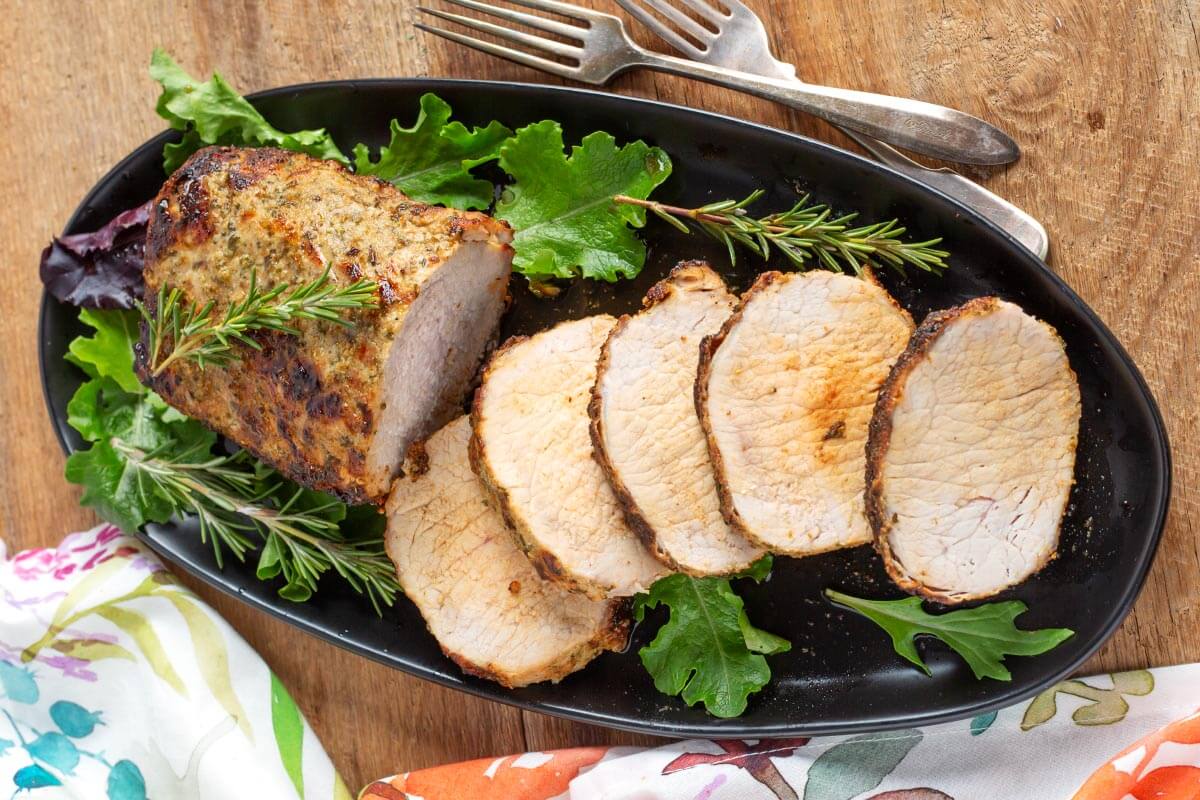 pork roast on black plate