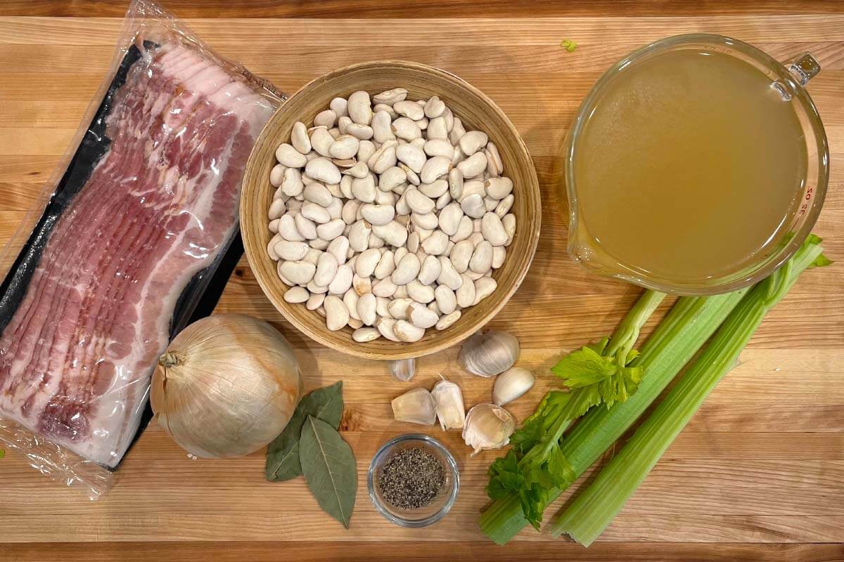 Instant Pot Butter Beans ingredients on a board.