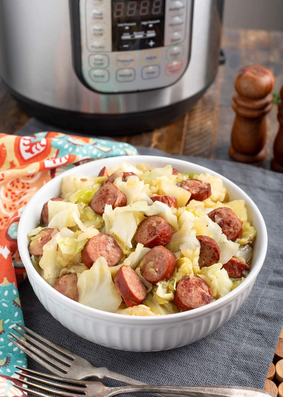 Instant Pot Cabbage and Kielbasa in a white bowl.