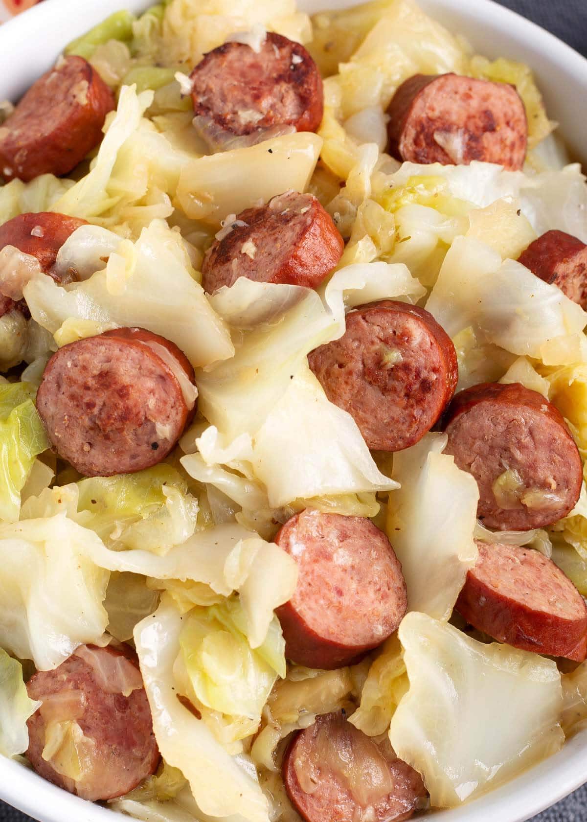 closeup of sausage and cabbage.