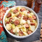 Instant Pot Cabbage and Kielbasa in white bowl.
