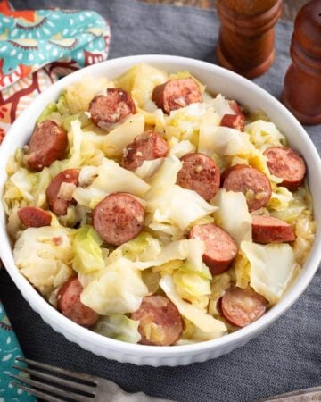 Instant Pot Cabbage and Kielbasa in white bowl.