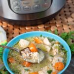 Instant Pot Chicken Rice Soup in blue bowl.