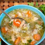 Instant Pot Chicken Rice Soup in blue bowl.